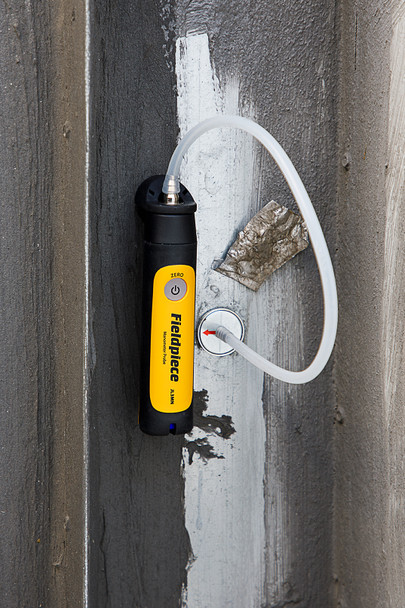 Fieldpiece JL3KMN Job Link Manometer hanging in use