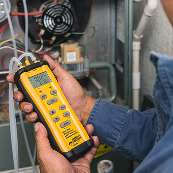 Fieldpiece SDMN6 Dual-Port Manometer and Pressure Switch Tester in use