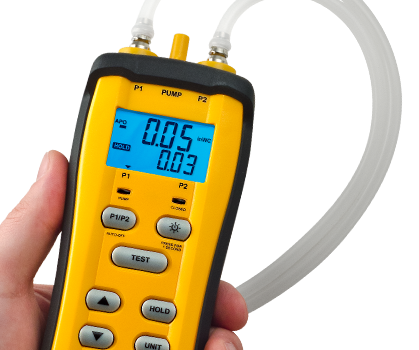 Fieldpiece SDMN6 Dual-Port Manometer in hand
