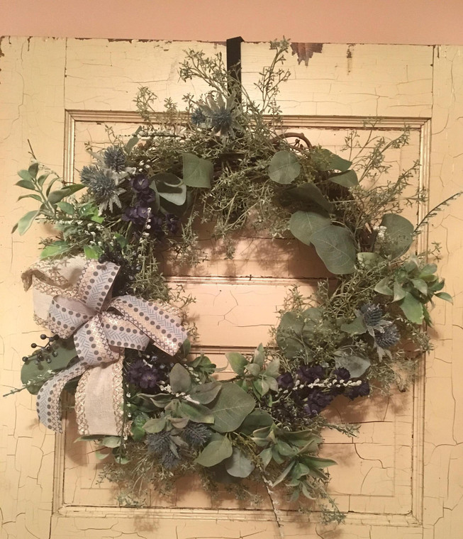 Grapevine wreath w/blue and greenery