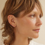 Rays of Light Stud Earrings in ear