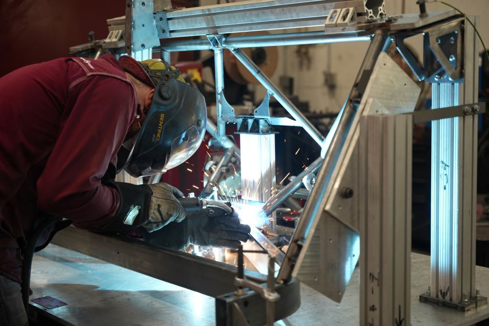 custom shock absorber being welded