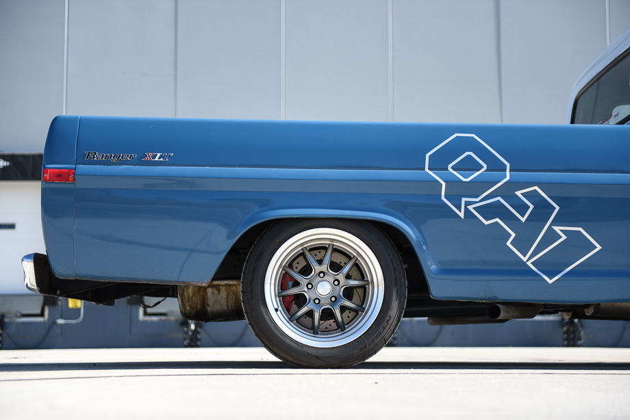 Extended wheel tubs on the 1972 Ford F100 accommodate wider rear tires, ensuring maximum traction and a sleek, custom look.