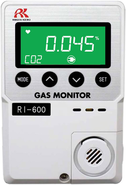 Front view of the RKI RI-600 Carbon Dioxide Detector, featuring a compact design with an LCD digital display that provides five-digit gas concentration readings. The device includes multicolored LED indicators (green, orange, red) for gas alarms and status alerts. Designed for wall mounting, the RI-600 uses Non-Dispersive Infrared (NDIR) technology to detect CO2 with high accuracy and outputs analog 4-20mA signals. Ideal for indoor applications with power options of 115 VAC or 24 VDC.