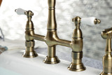 Kingston Brass KS1273PLBS Heritage Bridge Kitchen Faucet with Brass Sprayer, Antique Brass
