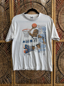 Vintage 90s Shaq Shaquille O’Neal Slam Dunk Orlando Magic White T-Shirt Size Youth XL Vintage 90s Shaq Shaquille O’Neal Slam Dunk Orlando Magic White T-Shirt Size Youth XL