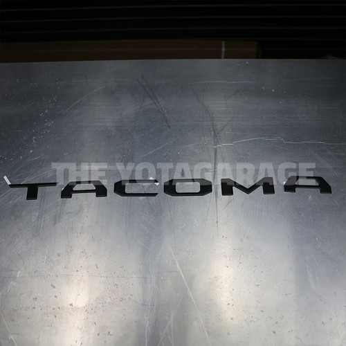 Toyota OEM Tailgate Tacoma Letter Insert - Black | 2024+ Toyota Tacoma Toyota OEM Tailgate Tacoma Letter Insert - Black | 2024+ Toyota Tacoma