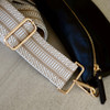 Cream bag strap-with black belt bag