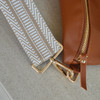 Cream bag strap-with brown belt bag