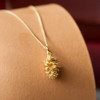 gold pinecone necklace