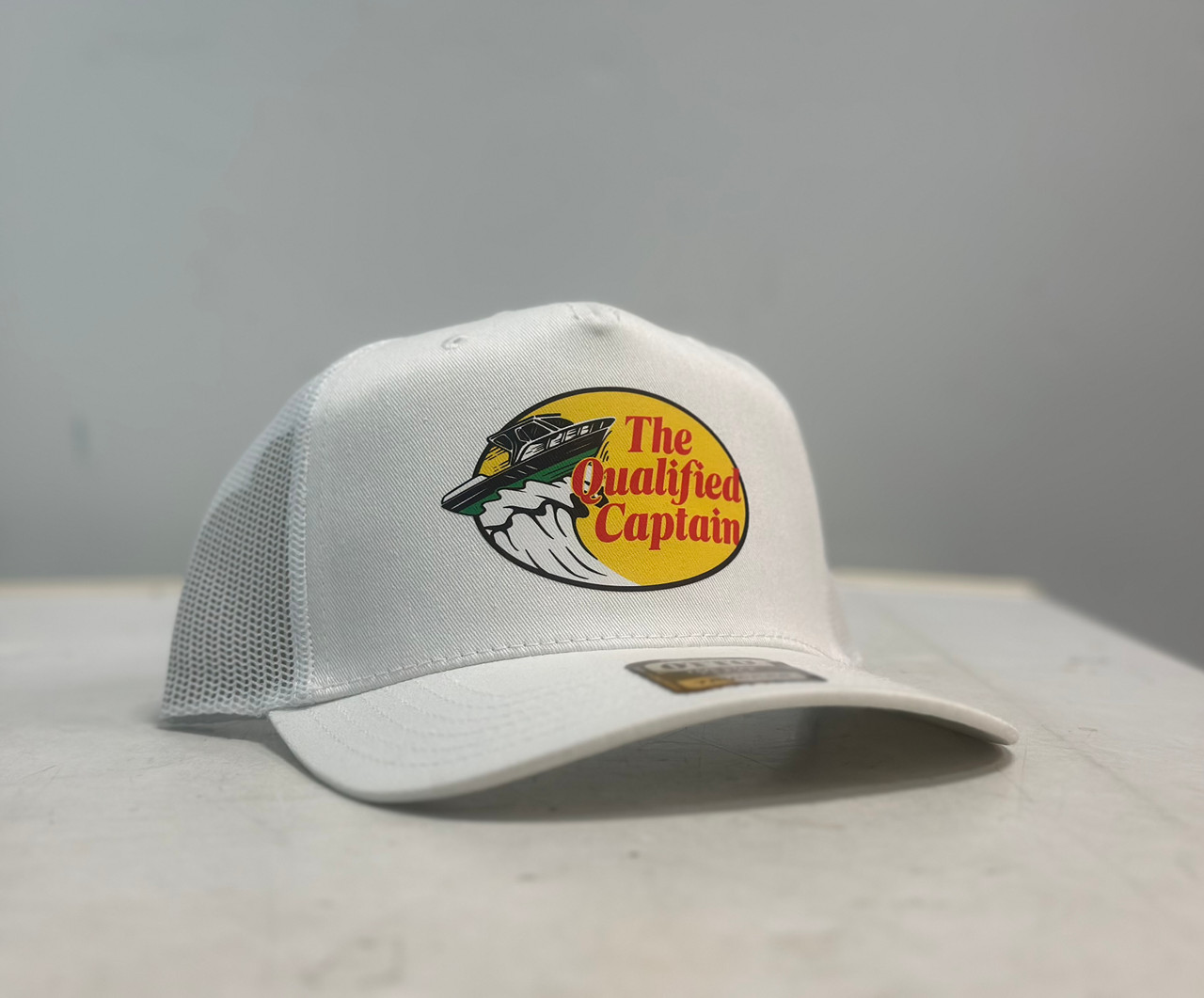 Qualified Captain - Full Send Hat
Mid profile - unstructured snapback cap
Light weight
100% recycled nylon
Single panel at front, quick dry fabric, plastic snapback
One size fits all