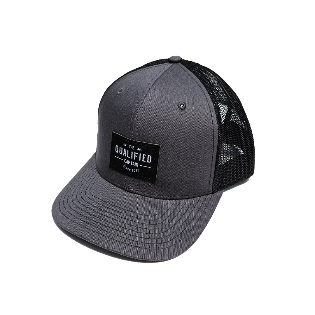 The Qualified Captain Shipwrecked Woven Label Hat