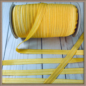 light gold fold over elastic in frame light gold fold over elastic in frame