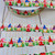 Gnomes and Flowers 1" Grosgrain Ribbon By The Yard Picture 1 Gnomes and Flowers 1" Grosgrain Ribbon By The Yard Picture 1