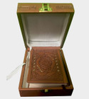 Brown Mushaf in a brown case
