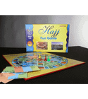 Hajj Fun Game board with colorful playing pieces and Hajj learning cards