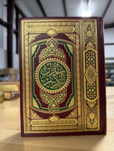 Front cover image of the book "Mushaf - Gold and Red Cover"