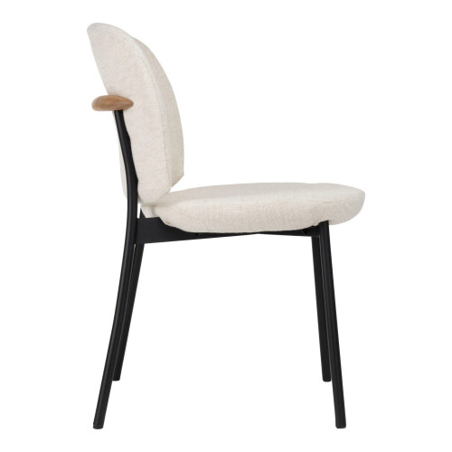 Side view of Solace Side Chair with upholstered seat and back, solid wood accent, and powder-coated steel frame.