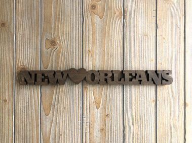 Laser cut and stained wood New Orleans sign