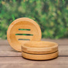 Round bamboo dish for shampoo bars and conditioner bars, with slots to let water drain