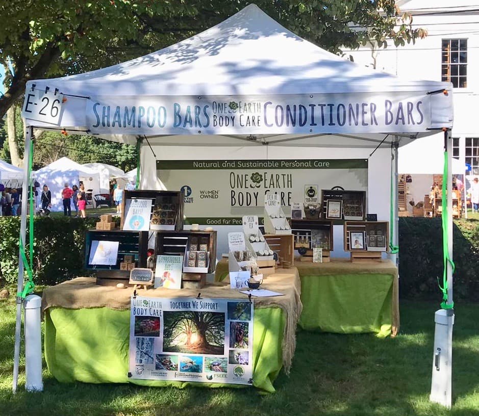 One Earth Body Care festival booth