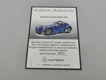 Bugatti 57SC Atlantic Silver Wire Wheel Blue - Certificate #0943 Bugatti 57SC Atlantic Silver Wire Wheel Blue - Certificate #0943