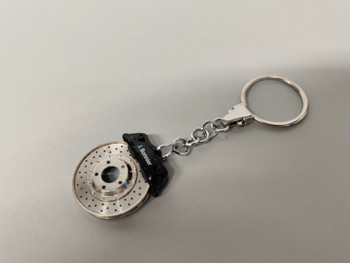 Combo Set - Brake Disc Keychain & AA Cleaning Cloth J. Bonnier Combo Set - Brake Disc Keychain & AA Cleaning Cloth J. Bonnier
