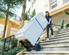 Powered Stair Climbing Carbon Steel Hand Truck with Telescoping Handle