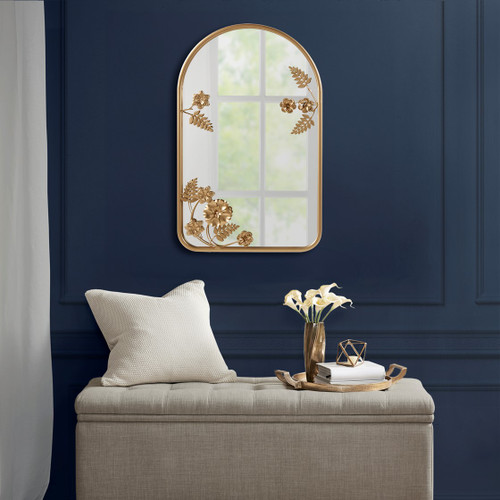 Madison Park Adaline Gold Arched Metal Floral Wall Mirror against navy wall