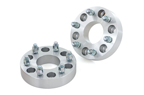 Wheel Spacer - 6 x 5.5 in Bolt Pattern - 1.5 in Thick - Lug Nuts Included - Aluminum - Clear Anodized - Pair
