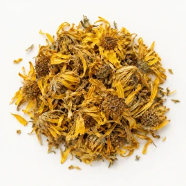 Image - Loose dried arnica flowers on a warm-white background.