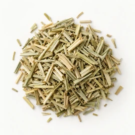 Image - Loose dried lemongrass on a warm-white background.