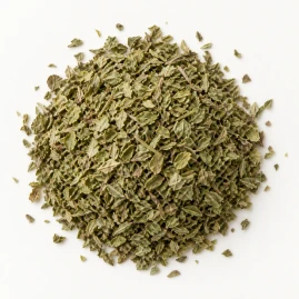 Image - Loose dried oregano on a warm-white background.
