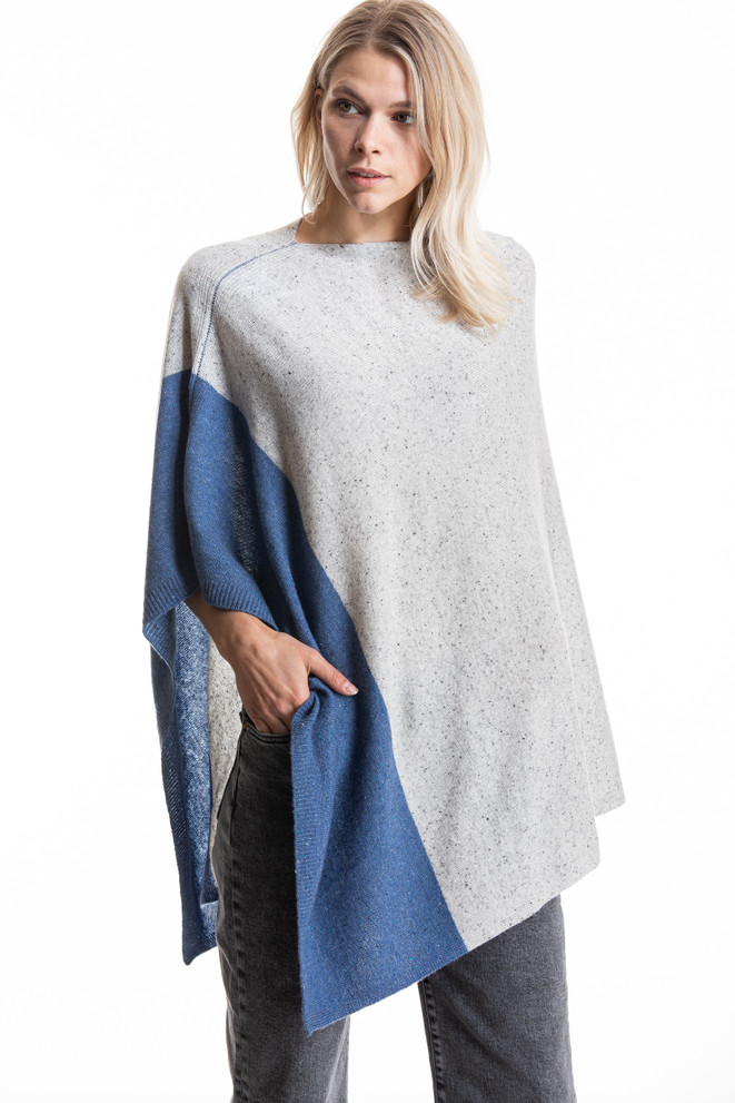 Front view of Paychi Guh cashmere poncho. This poncho is a V-neck, 2 toned with it being longer on the sides. 