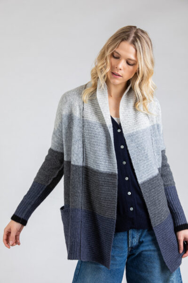 Front view of Paychi Guh cardigan. This cardigan is long sleeves with ribbed detail on the edges and multiple shades of grey.