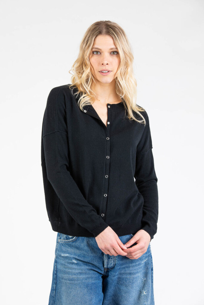 Front view of Paychi Guh. cardigan. This cardigan is a crew neck with button down closure, drop shoulder, and relaxed fit.