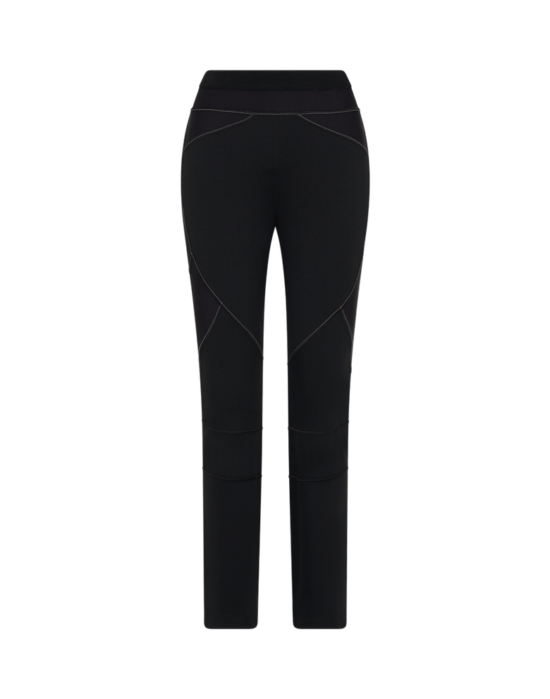 Heritage style multi seam, multi-panel slim leg pants in black tech Punto Milano jersey and ribbed jersey. Elastic waistband over a hip yoke in stretch rib. Diagonal inset of rib across the front hips. Side seams curve to the inseams, horizontal seams around knee and a diagonal inset panel wrapping around the leg. Panels join together with contrast ivory topstitch. Reverse has V-shape yoke with tape belt loop and silver metal HIGH tab.

Pulls on
Compact fabric
Stretch
Cool hand, slightly dry