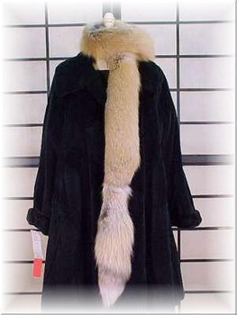 Golden Island Fox Fur Scarf  Full Skin Fox Fur Scarf Width: ~4" Length: ~80" Padded Grosgrain Lining Fur Origin: Norway Manufacturing: USA