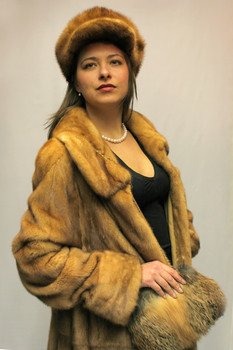Whiskey Mink Fur Jacket Whiskey Mink Fur 3/4 Flear Jacket Wing Collar Color Shown is Whiskey Mink Size Sample: 10-12 Medium Mink 3/4 Fur Jacket with Flare Style Hook and Eyes Closure Manufacturing: USA