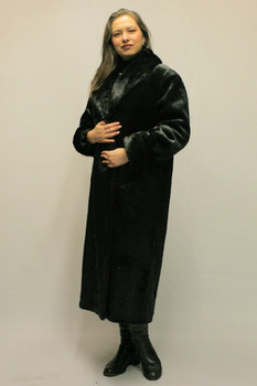 This is 100% faux fur not real.  Faux Fur Beaver Coat Faux Fur Black Beaver Coat With Mink Cuffs Size: 1X, 2X, 3X, 10-12 Medium Mink Shawl Collar Color Shown is Black Beaver Hook and Eyes Closure Manufacturing: USA