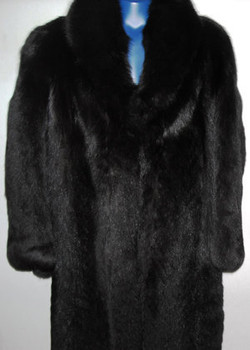 Full Skin Black Fox Ladies Raccoon vintage Fur coat Stand Up Collar Stright Sleeves Size: Large Light, Very Warm and Comfortable Hook and Eye Closure Fur Origin: USA Manufacturing: USA Vintage is a Pre-Owned Or Estate Piece One Of a kind, From Our Fur Collections Shoulder To Shoulder: 23" Inside Crossback:20" Collar to Bottom:52" Sweep:68" Neck to Sleeve: 36"
