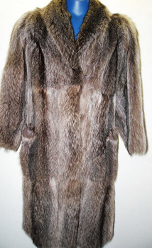 Full Skin Vintage Raccoon Ladies Raccoon vintage Fur coat Stand Up Collar Straight Sleeves Size: Large Light, Very Warm and Comfortable Hook and Eye Closure Fur Origin: USA Manufacturing: USA Vintage is a Pre-Owned Or Estate Piece One Of a kind, From Our Fur Collections Shoulder To Shoulder: 20" Inside Cross back:17" Collar to Bottom:47" Sweep:50" Neck to Sleeve: 31"