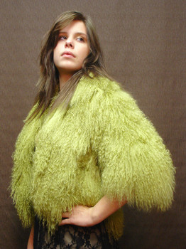 Green Curly Lamb Bolero Jacket Green Bolero Jacket Retro Style Length: 18 inches Sleeve 19" Crossback 13 1/2" Fur Origin: France Manufactured: USA