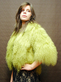 Green Curly Lamb Bolero Jacket Green Bolero Jacket Retro Style Length: 18 inches Sleeve 19" Crossback 13 1/2" Fur Origin: France Manufactured: USA