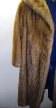 Vintage Full Skin White Mink Ladies Raccoon vintage Fur coat Stand Up Collar Straight Sleeves Size: Large Light, Very Warm and Comfortable Hook and Eye Closure Fur Origin: USA Manufacturing: USA Vintage is a Pre-Owned Or Estate Piece One Of a kind, From Our Fur Collections Shoulder To Shoulder: 18" Inside Cross back:15" Collar to Bottom:39" Sweep:52" Neck to Sleeve: 26"