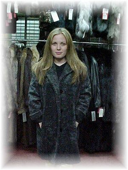 Sheared-Style Gray Faux Fur Jacket Faux Fur Jacket Sheared Styling Notch Collar Turn-Back Cuffs Button Closures Satin Lining Fur Origin: USA Manufacturing: USA