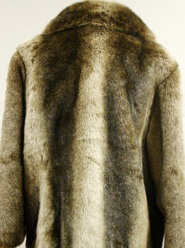 Faux Raccoon Fur Woman's Jacket Faux Raccoon Fur Woman's Jacket length 29" Sweep 54" Sleeve 30" Crossback 20" Notch Collar Hook and Eye Closure Color Shown is Raccoon Manufacturing: USA