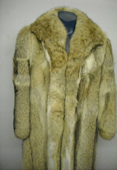 Full Skin Ladies Coyotte Raccoon vintage Fur coat Stand Up Collar Stright Sleeves Size: Large Light, Very Warm and Comfortable Hook and Eye Closure Fur Origin: USA Manufacturing: USA Vintage is a Pre-Owned Or Estate Piece One Of a kind, From Our Fur Collections Shoulder To Shoulder: 19" Inside Crossback:16" Collar to Bottom:48" Sweep:82" Neck to Sleeve: 32"