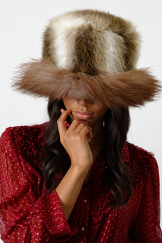 Faux Fur Hat w/ Real Brown Fox Fur Trim Faux Fur Hat w/ Real Brown Fox Fur Trim Genuine Brown Fox Trim Color: Brown Origin: Norway Manufactured: USA