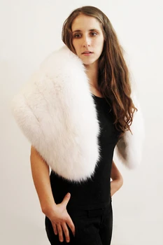 White Fox Fur Stole Glamorous White Fox Fur Stole Genuine Fox Fur One size fits most 6-14 Length of Stole: 24 Inches Crossback: 10 Inches Custom Made Fur Origin: Norway Manufactured: USA